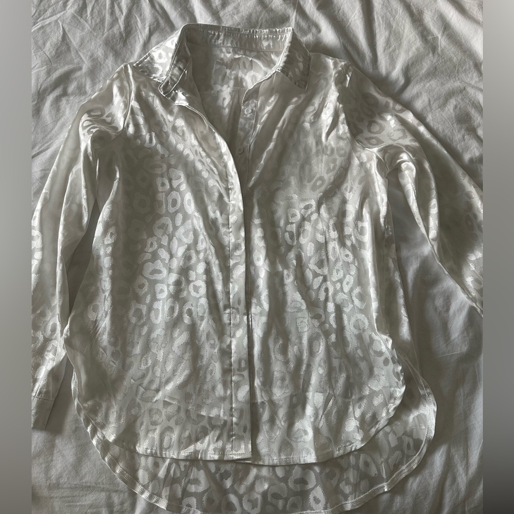Long sleeve Amazon button up t shirt.